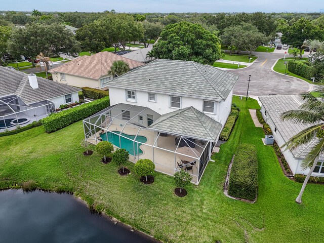256 Coconut Pt, Jupiter, FL 33458 - aerial view of property and surrounding area featuring a pool area and a large body of water