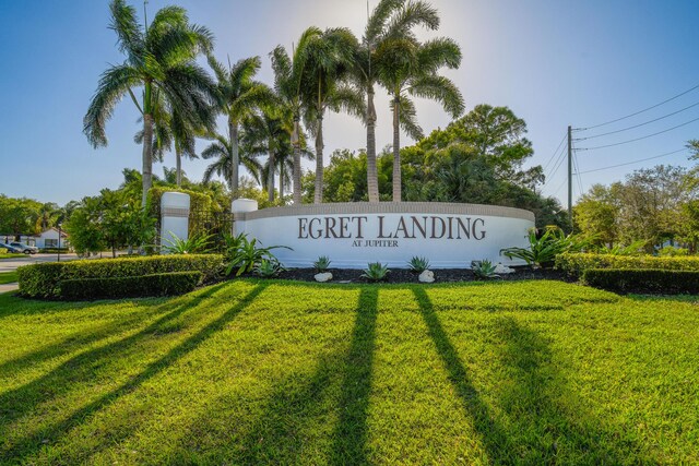 256 Coconut Pt, Jupiter, FL 33458 - community sign featuring a lawn