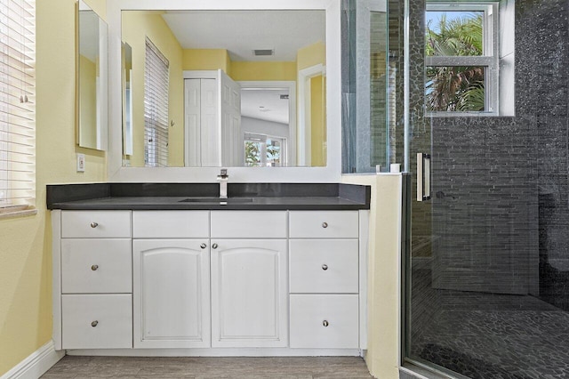 16370 Via Fontana, Delray Beach, FL 33484 - full bath featuring vanity, a shower stall, wood finished floors, and baseboards