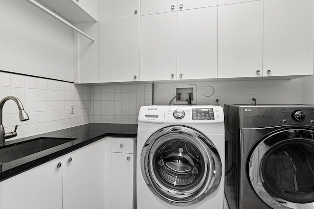 16370 Via Fontana, Delray Beach, FL 33484 - laundry room with cabinet space and independent washer and dryer