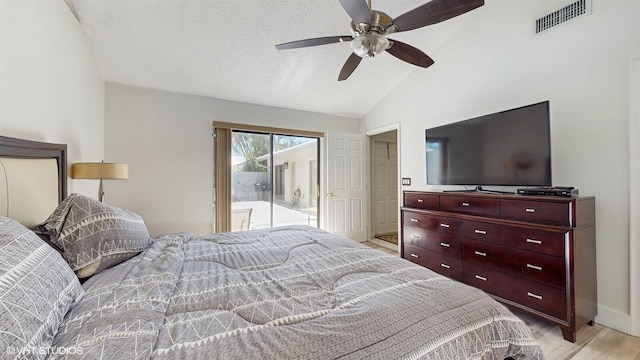 8912 Thumbwood Cir Unit C, Boynton Beach, FL 33436 - bedroom with access to outside, vaulted ceiling, light wood-type flooring, ceiling fan, and a textured ceiling
