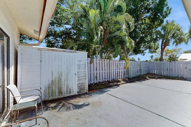 8912 Thumbwood Cir Unit C, Boynton Beach, FL 33436 - fenced backyard featuring a patio area