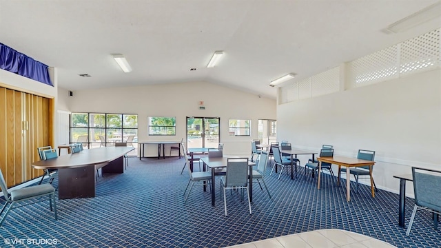 8912 Thumbwood Cir Unit C, Boynton Beach, FL 33436 - dining room with carpet, plenty of natural light, and vaulted ceiling