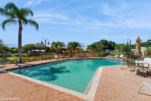8912 Thumbwood Cir Unit C, Boynton Beach, FL 33436 - community pool featuring a patio