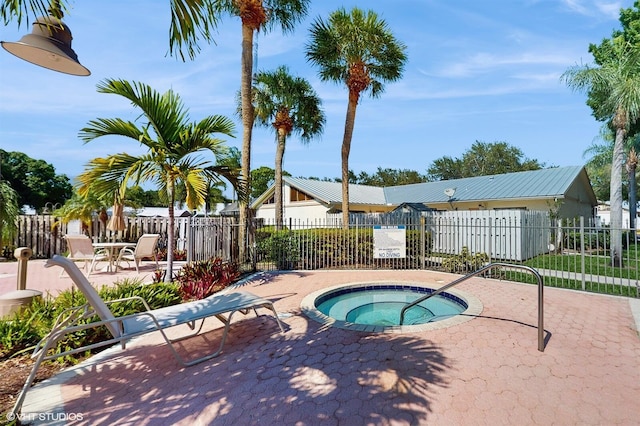 8912 Thumbwood Cir Unit C, Boynton Beach, FL 33436 - view of swimming pool featuring a hot tub and a patio
