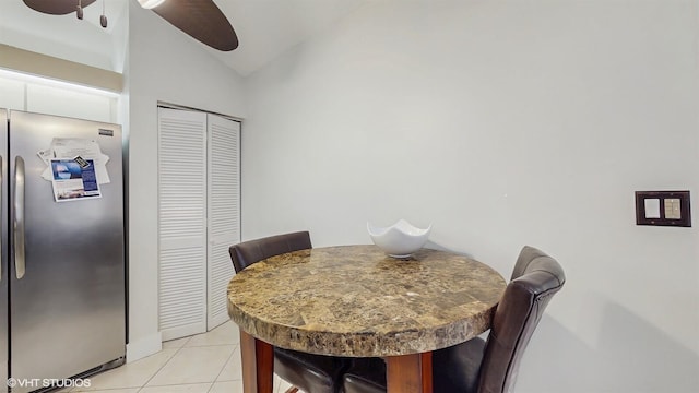 8912 Thumbwood Cir Unit C, Boynton Beach, FL 33436 - dining room with ceiling fan, light tile patterned flooring, and lofted ceiling