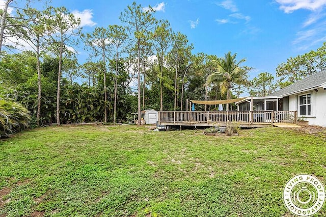 4038 Calamondin Blvd, The Acreage, FL 33470 - view of grassy yard featuring a sunroom and a deck