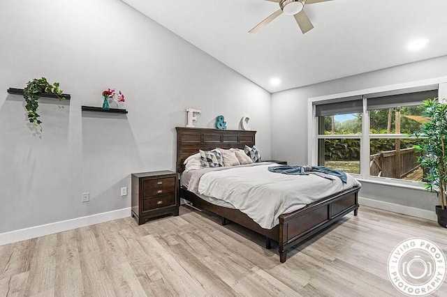 4038 Calamondin Blvd, The Acreage, FL 33470 - bedroom with vaulted ceiling, light wood finished floors, baseboards, and a ceiling fan