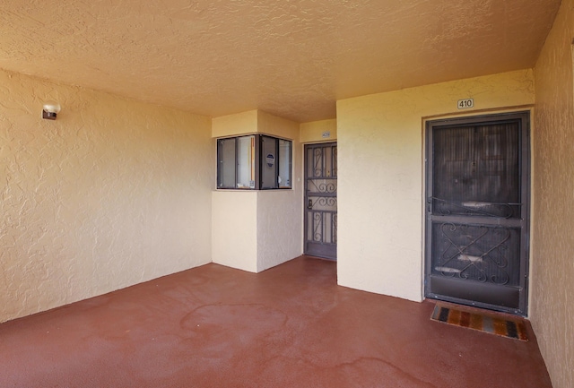 3154 Via Poinciana Unit 409, Lake Worth, FL 33467 - property entrance featuring stucco siding