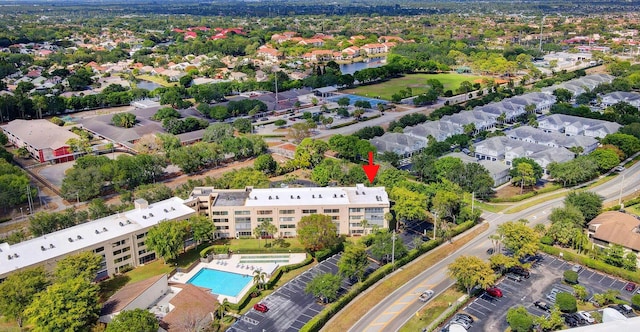 3154 Via Poinciana Unit 409, Lake Worth, FL 33467 - aerial view of a pool and a large body of water