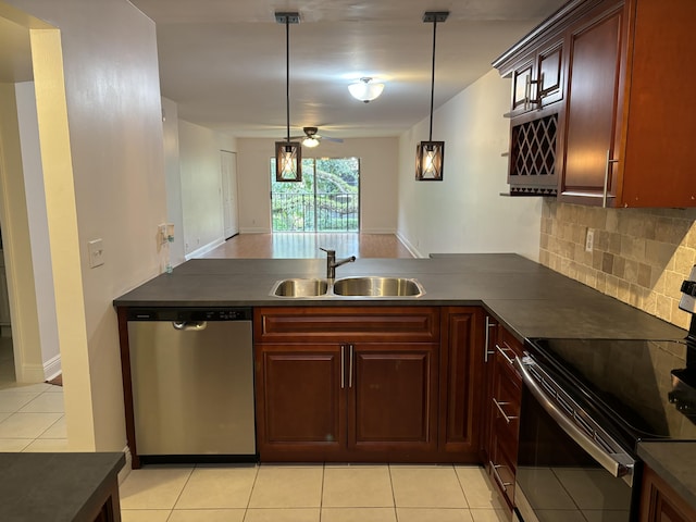 2895 SW 22nd Ave Unit 2060, Delray Beach, FL 33445 - kitchen featuring dishwasher, electric stove, a peninsula, and dark countertops