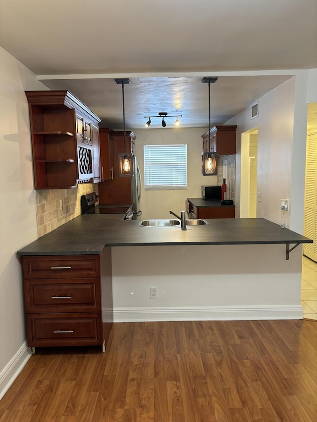2895 SW 22nd Ave Unit 2060, Delray Beach, FL 33445 - kitchen featuring electric range oven, dark countertops, and backsplash