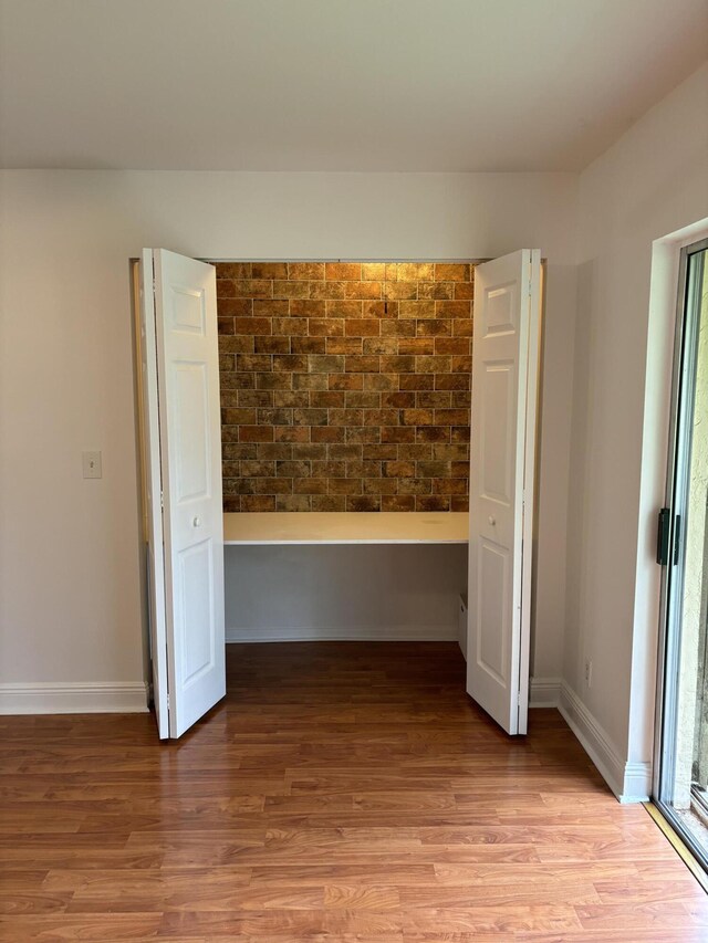 2895 SW 22nd Ave Unit 2060, Delray Beach, FL 33445 - unfurnished bedroom with light wood-type flooring and baseboards