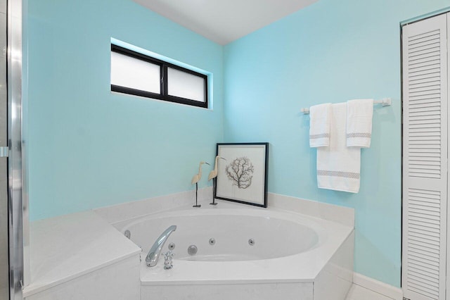 4483 Meadowlark Ln, Boynton Beach, FL 33436 - full bathroom featuring a closet and a jetted tub