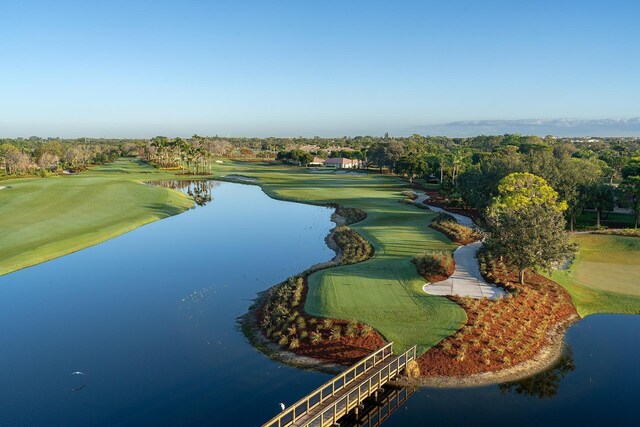 4483 Meadowlark Ln, Boynton Beach, FL 33436 - drone / aerial view of a nearby body of water, a golf club, and a tree filled landscape