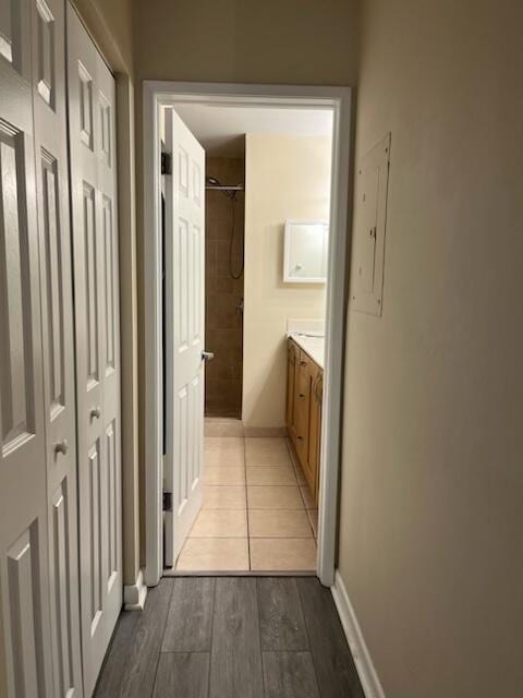 3153 Clint Moore Rd Unit 204, Boca Raton, FL 33496 - hallway featuring wood finished floors and baseboards