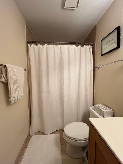 3153 Clint Moore Rd Unit 204, Boca Raton, FL 33496 - full bath with vanity, toilet, tile patterned flooring, and a shower with curtain