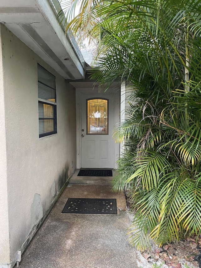 8587 SW 18th Ave, Stuart, FL 34997 - property entrance with stucco siding