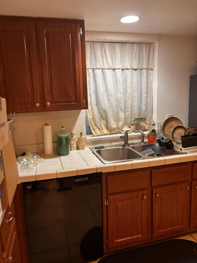 8587 SW 18th Ave, Stuart, FL 34997 - kitchen with dishwasher, a sink, tile countertops, brown cabinets, and recessed lighting