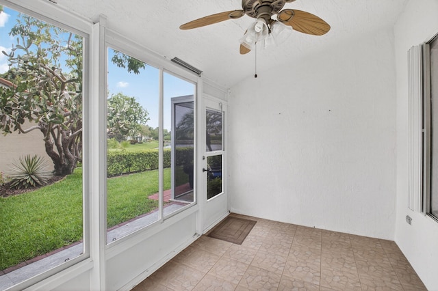 6095 Floral Lakes Dr, Delray Beach, FL 33484 - unfurnished sunroom featuring ceiling fan