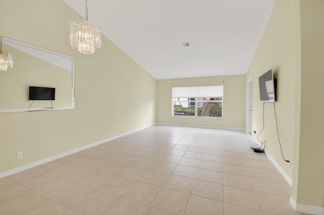 6095 Floral Lakes Dr, Delray Beach, FL 33484 - tiled empty room featuring a chandelier, vaulted ceiling, and baseboards