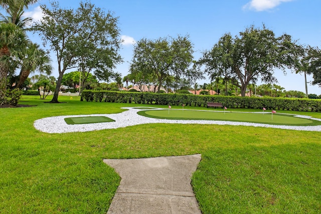 6095 Floral Lakes Dr, Delray Beach, FL 33484 - view of property's community featuring a putting green and a yard
