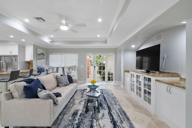1948 Coco Palm Pl, Lauderdale By The Sea, FL 33062 - living area featuring ornamental molding, a raised ceiling, a ceiling fan, recessed lighting, and baseboards