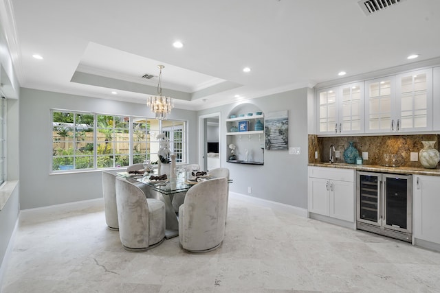 1948 Coco Palm Pl, Lauderdale By The Sea, FL 33062 - dining room with beverage cooler, crown molding, wet bar, recessed lighting, and baseboards