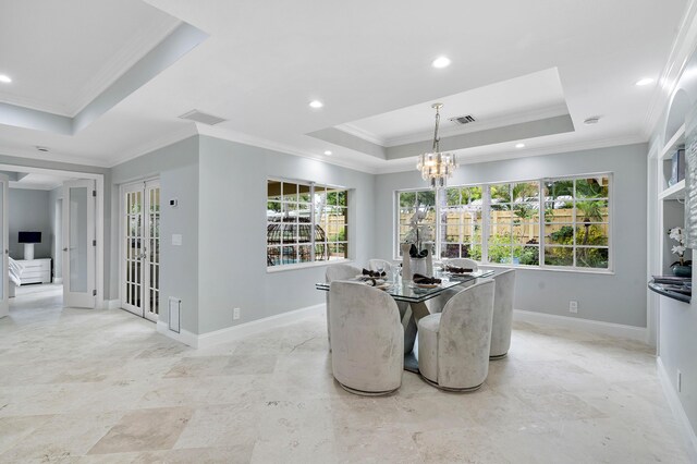 1948 Coco Palm Pl, Lauderdale By The Sea, FL 33062 - dining room with a tray ceiling, ornamental molding, a chandelier, baseboards, and plenty of natural light