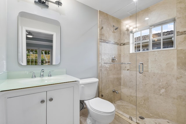 1948 Coco Palm Pl, Lauderdale By The Sea, FL 33062 - full bath featuring a stall shower, toilet, vanity, and healthy amount of natural light