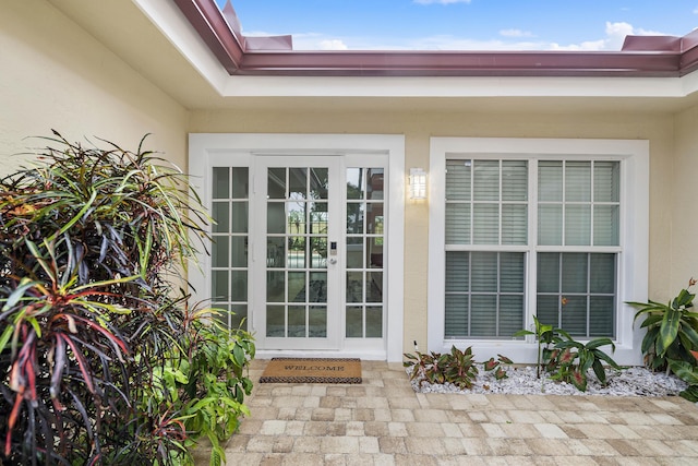 1948 Coco Palm Pl, Lauderdale By The Sea, FL 33062 - doorway to property with stucco siding