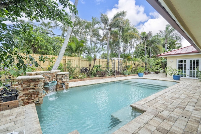 1948 Coco Palm Pl, Lauderdale By The Sea, FL 33062 - view of pool with french doors, a fenced backyard, and a patio