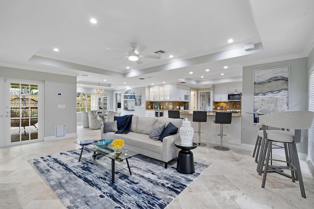 1948 Coco Palm Pl, Lauderdale By The Sea, FL 33062 - living room with a raised ceiling, crown molding, a ceiling fan, recessed lighting, and baseboards