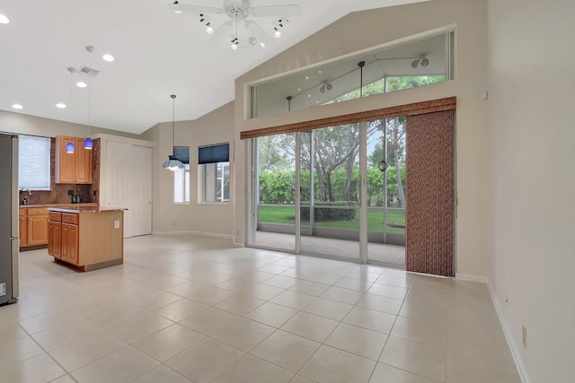 9066 Bay Harbour Cir, West Palm Beach, FL 33411 - unfurnished living room with baseboards, high vaulted ceiling, light tile patterned floors, ceiling fan, and recessed lighting