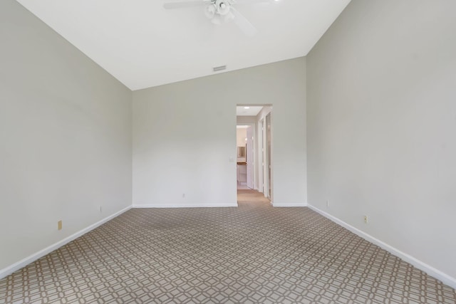 9066 Bay Harbour Cir, West Palm Beach, FL 33411 - unfurnished room featuring lofted ceiling, ceiling fan, baseboards, and carpet flooring