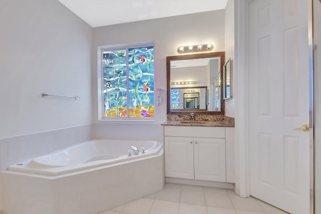 9066 Bay Harbour Cir, West Palm Beach, FL 33411 - full bath featuring vanity, a garden tub, and tile patterned flooring