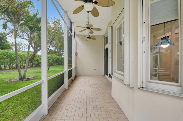 9066 Bay Harbour Cir, West Palm Beach, FL 33411 - unfurnished sunroom with a ceiling fan