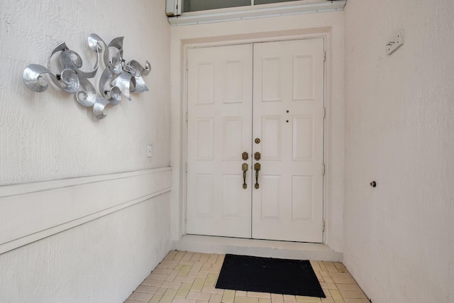 9066 Bay Harbour Cir, West Palm Beach, FL 33411 - view of exterior entry featuring stucco siding