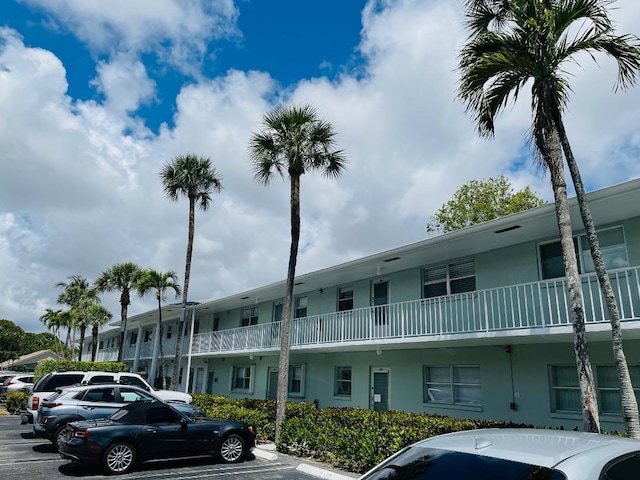 2720 SW 22nd Ave Unit 1507, Delray Beach, FL 33445 - view of building exterior featuring uncovered parking