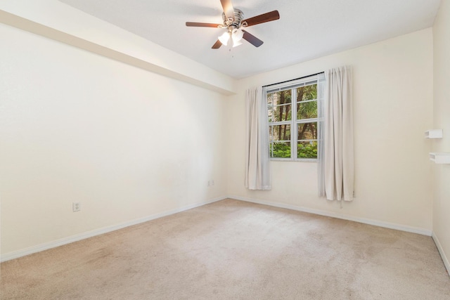 1801 N Flagler Dr Unit 107, West Palm Beach, FL 33407 - spare room with ceiling fan, light colored carpet, and baseboards