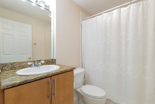 1801 N Flagler Dr Unit 107, West Palm Beach, FL 33407 - full bathroom with toilet, vanity, and a shower with shower curtain