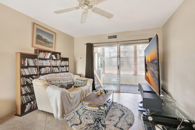 1021 Crystal Lake Dr Unit 109, Deerfield Beach, FL 33064 - living area with ceiling fan and light tile patterned floors