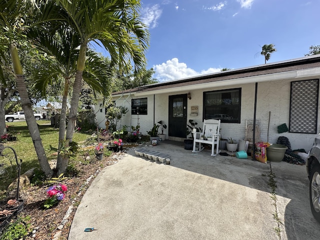 1216 Neoga St, Jupiter, FL 33458 - view of covered porch