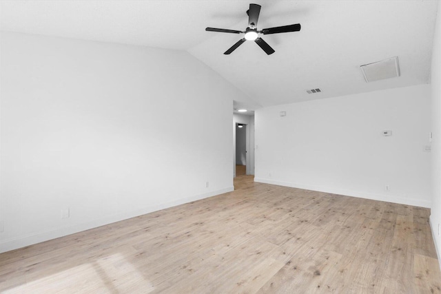 6681 4th St, Jupiter, FL 33458 - spare room with lofted ceiling, light wood-style flooring, a ceiling fan, and baseboards