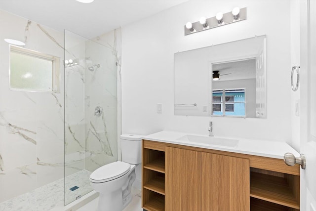 6681 4th St, Jupiter, FL 33458 - bathroom featuring toilet, vanity, a marble finish shower, and healthy amount of natural light