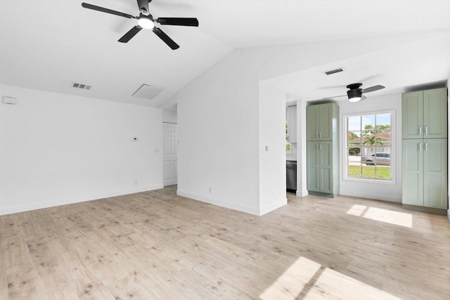 6681 4th St, Jupiter, FL 33458 - spare room with a ceiling fan, lofted ceiling, light wood-style floors, and baseboards