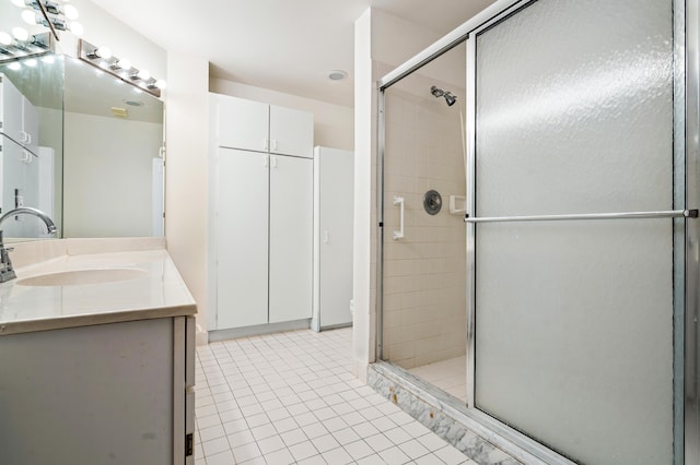 9165 Vineland Ct Unit B, Boca Raton, FL 33496 - full bathroom featuring a stall shower, tile patterned floors, and vanity