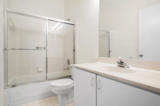 9165 Vineland Ct Unit B, Boca Raton, FL 33496 - full bathroom with vanity, bath / shower combo with glass door, and tile patterned floors