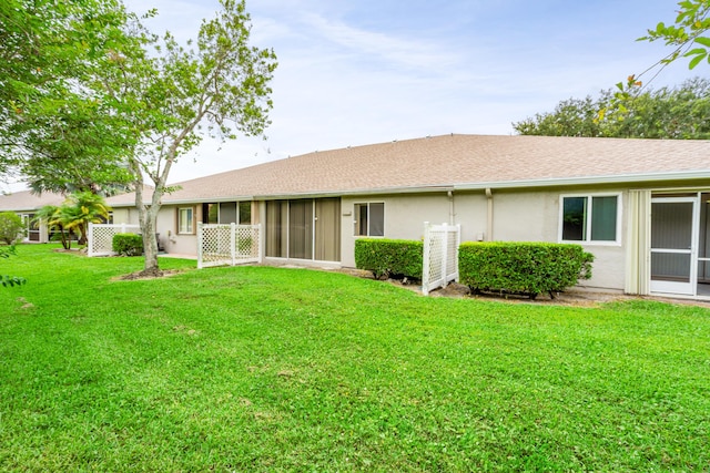 9165 Vineland Ct Unit B, Boca Raton, FL 33496 - back of house with a lawn, stucco siding, and a shingled roof