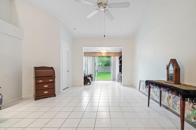 9165 Vineland Ct Unit B, Boca Raton, FL 33496 - foyer entrance featuring a ceiling fan, a textured ceiling, and light tile patterned floors